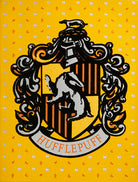 Hufflepuff embellished Harry Potter card with house emblem and decorative details, ideal for home decor or collection.