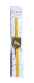 Hufflepuff enamel charm bookmark featuring Harry Potter branding, with a colorful Hufflepuff crest design on a metal bookmark.