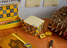 Harry Potter Hufflepuff memo cube from Insight Editions, featuring the house crest and vibrant yellow design for home or office use.