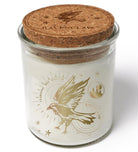 Color-changing Ravenclaw candle from Harry Potter by Insight Editions, featuring blue and silver design with magical glow.