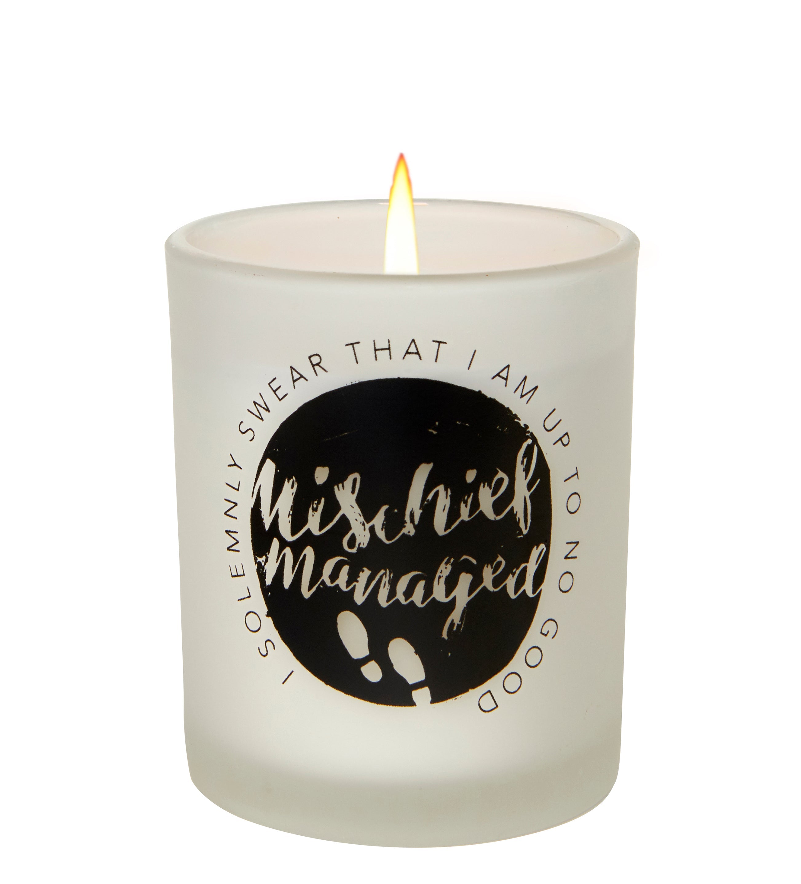 Harry Potter "Mischief Managed" glass votive candle in a decorative home goods display by Insight Editions.