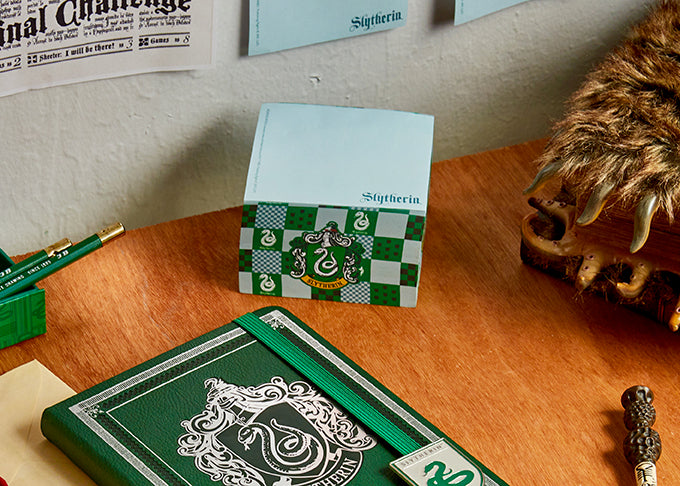 Harry Potter Slytherin Memo Cube by Insight Editions, featuring green Slytherin house emblem and design for home or office use