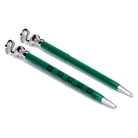 Harry Potter Slytherin pen and pencil set by Insight Editions, featuring green and silver themed writing tools on a display.