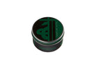 Slytherin scented candle from Harry Potter by Insight Editions, 2 oz. in a decorative glass jar with Slytherin house emblem.