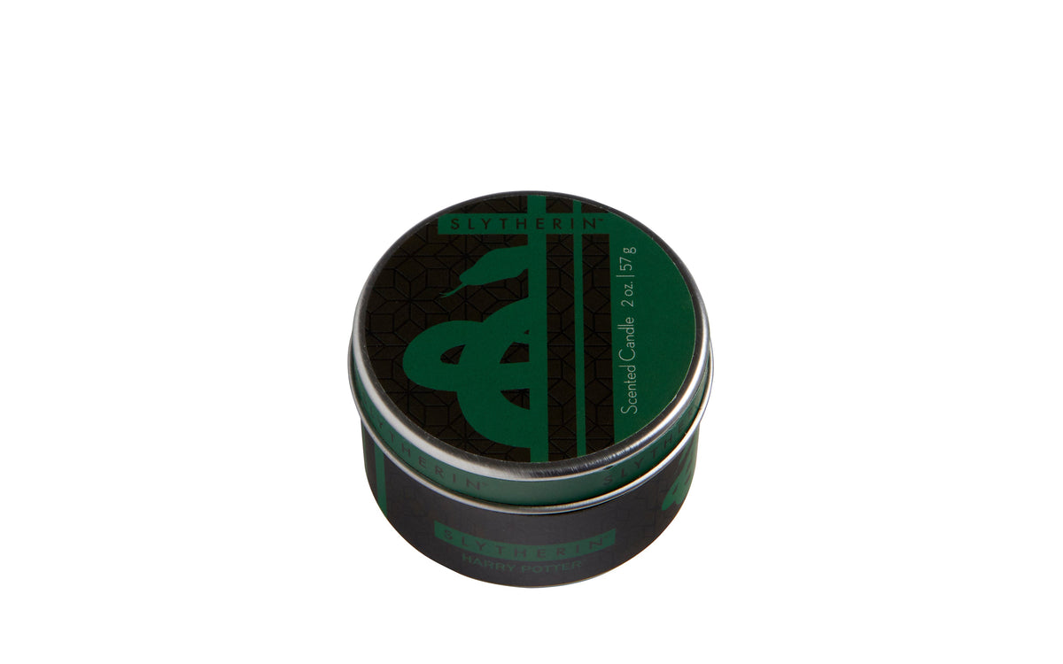 Small Slytherin scented candle from Harry Potter, in a dark green container with Slytherin emblem, ideal for home decor.