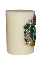 Slytherin House insignia candle from Harry Potter series by Insight Editions, featuring a sculpted Slytherin crest on a decorative candle.