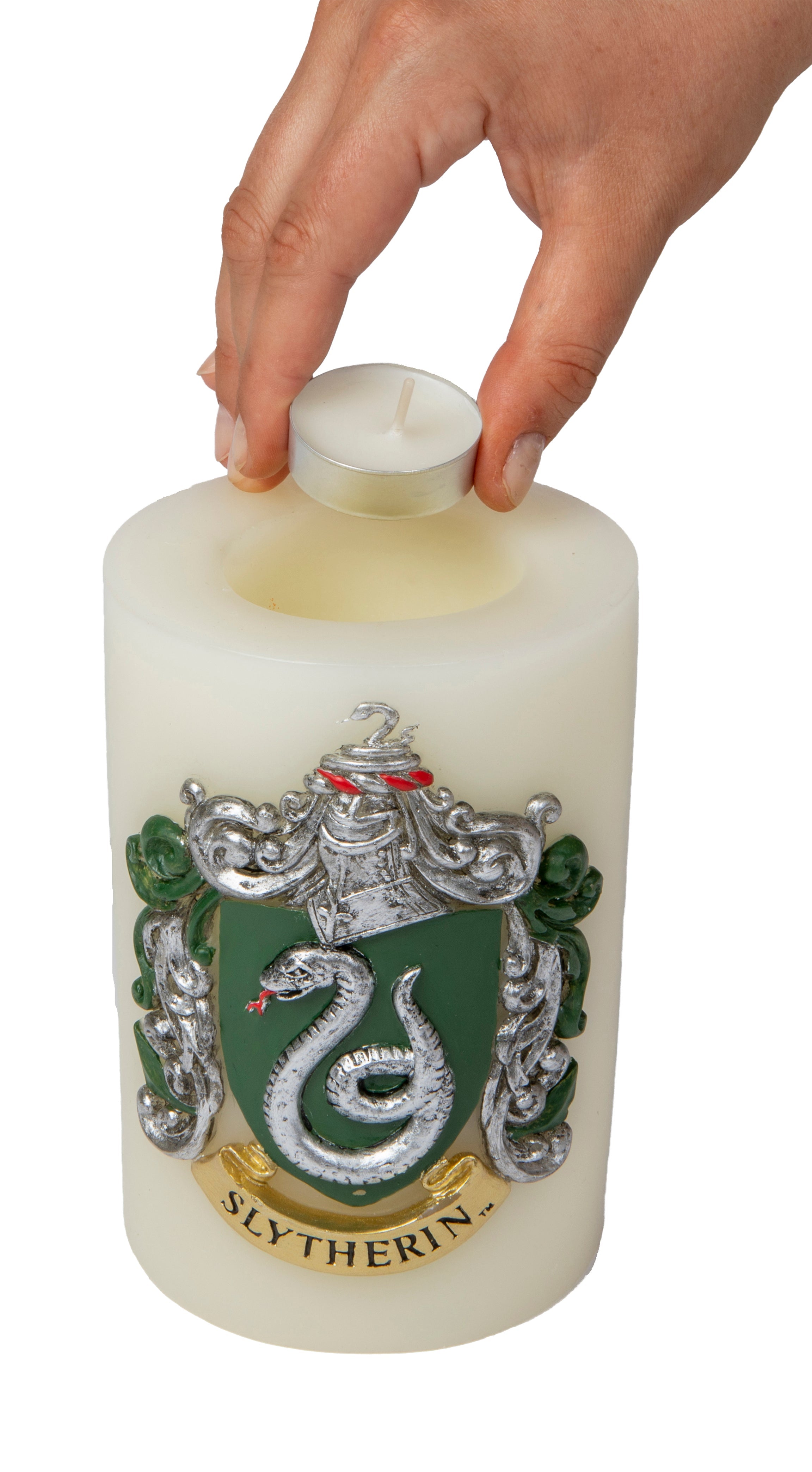 Slytherin insignia candle with sculpted Harry Potter house emblem, green wax, and detailed design from Insight Editions.