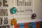 Set of six Harry Potter spells and charms glass magnets featuring magical symbols and designs, perfect for home decor.
