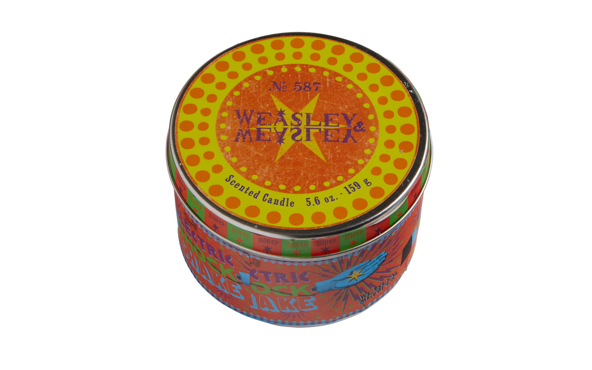 Harry Potter Weasleys' Wizard Wheezes scented candle with cinnamon scent, 5.6 oz, in a decorative jar, ideal for home decor.
