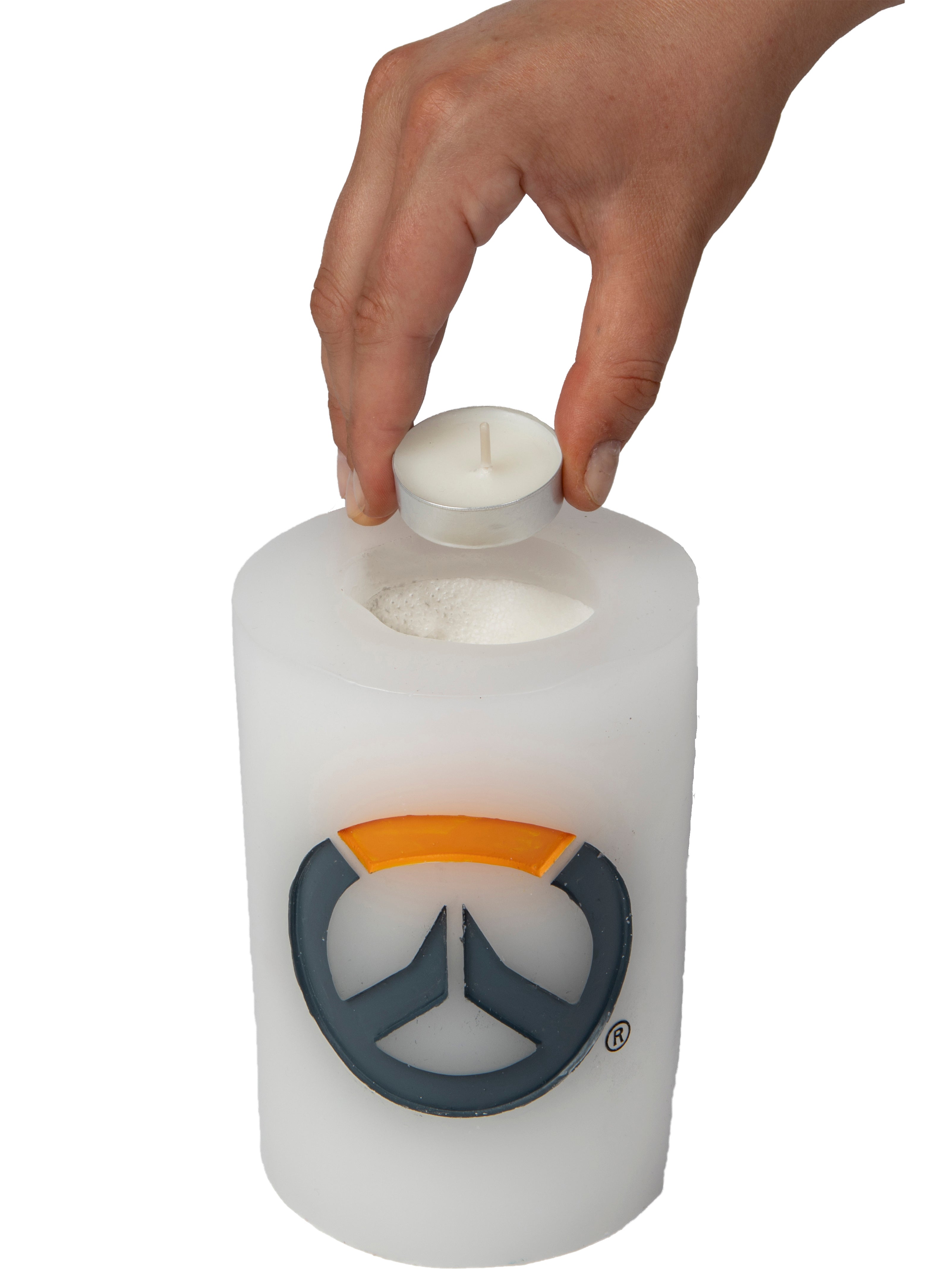 Sculpted Overwatch Insignia candle by Insight Editions, featuring detailed design on a home decor candle.