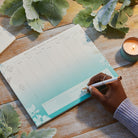 Insight Editions self-care weekly planner notepad for home organization, featuring motivational designs and space for weekly notes.