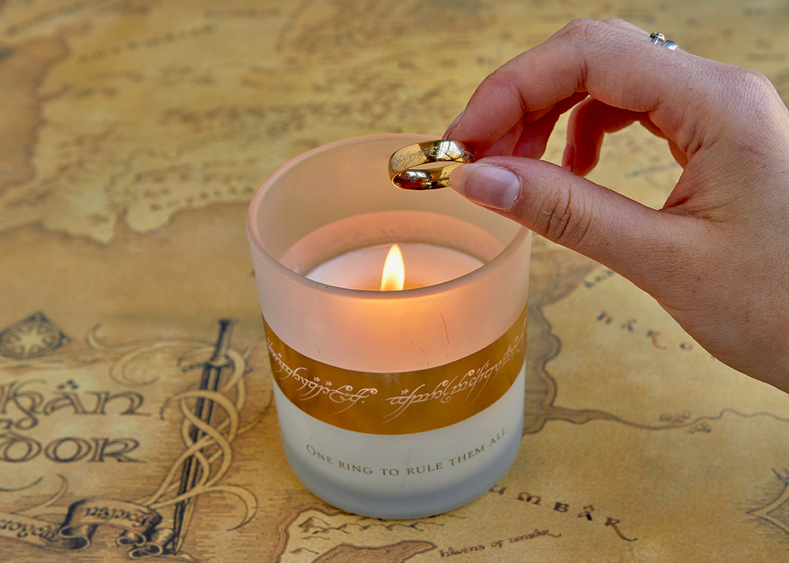 Insight Editions The Lord of the Rings One Ring glass candle in a home decor setting, showcasing the detailed ring design.