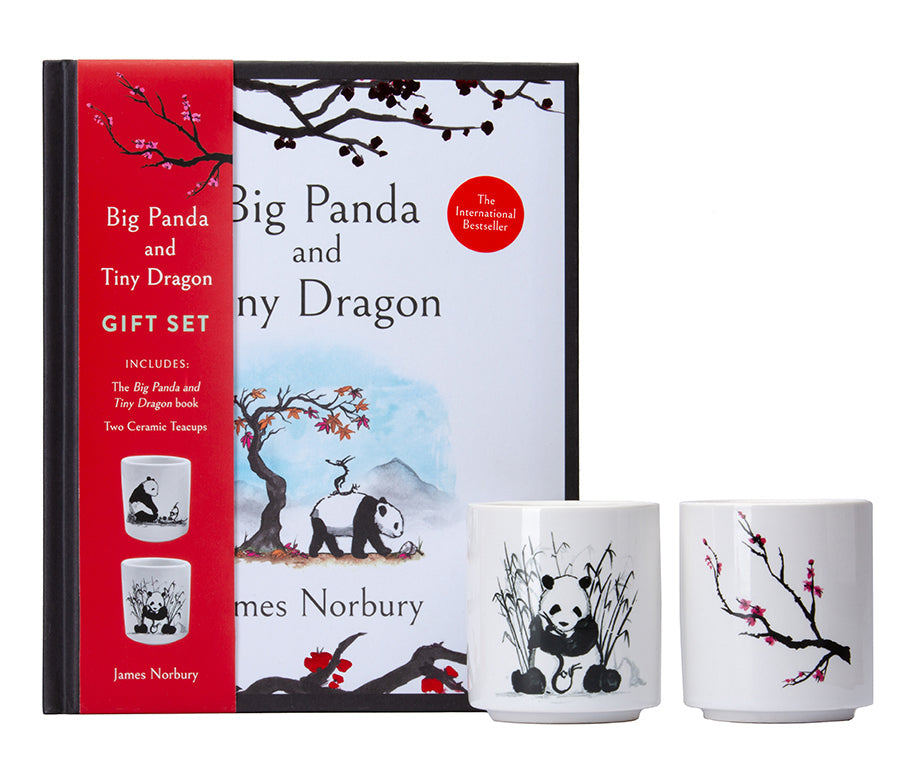 Big Panda and Tiny Dragon Tea for Two Gift Set kit featuring illustrated packaging and two tea cups on a wooden surface.