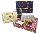 Harry Potter Hogwarts Gift Wrap Stationery Set kit by Insight Editions, featuring wizard-themed wrapping paper and stationery accessories.
