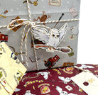 Harry Potter Hogwarts gift wrap and stationery set by Insight Editions with wizard-themed paper and accessories.
