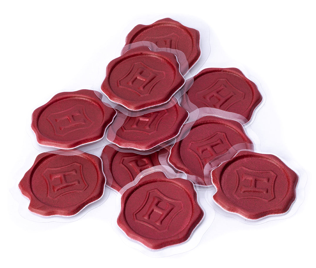 Set of 50 Harry Potter Hogwarts sticker seals from Insight Editions, featuring magical designs and iconic house emblems.