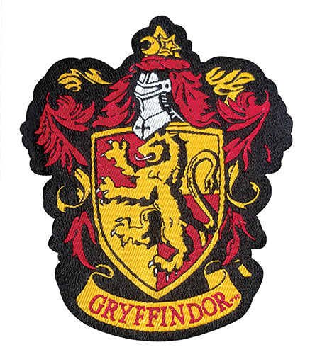 Harry Potter Gryffindor scarf knitting kit by Insight Editions, featuring colorful yarn and knitting tools for a magical craft project.