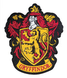 Harry Potter Gryffindor scarf knitting kit by Insight Editions, featuring colorful yarn and knitting tools for a magical craft project.