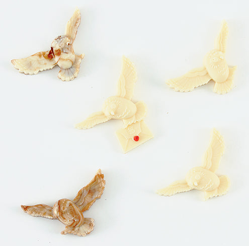 Harry Potter Make Your Own Chocolate Owls kit by Insight Editions with chocolate owl molds and ingredients for crafting magical treats.