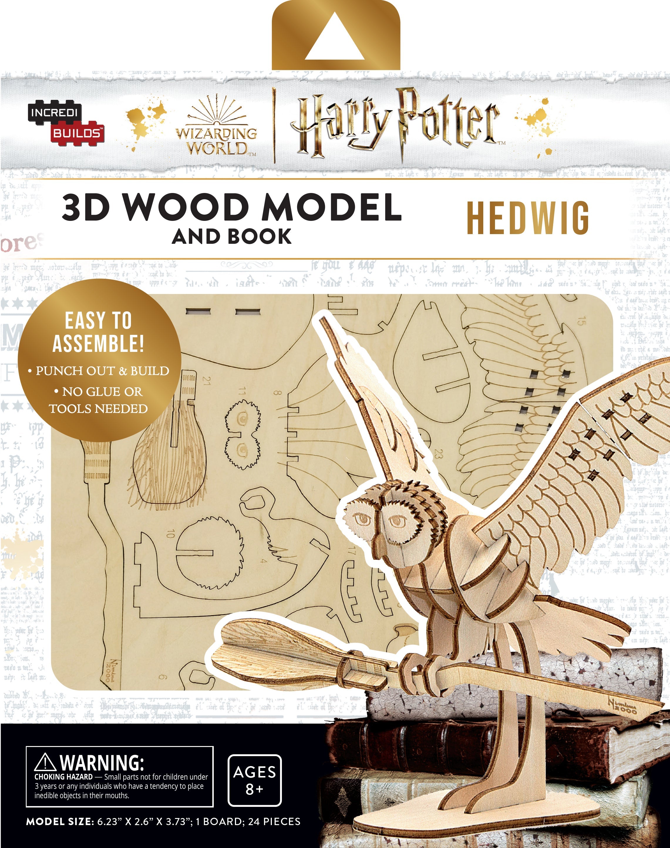 Harry Potter Hedwig 3D wood model and book kit by IncrediBuilds, featuring detailed Hedwig owl and instructional book.