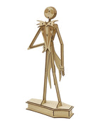 IncrediBuilds Nightmare Before Christmas Jack Skellington 3D wood model kit with book, featuring detailed wooden figure and packaging.