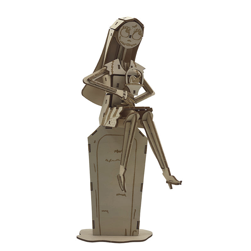 IncrediBuilds Nightmare Before Christmas Sally kit with book and 3D wood model, featuring Sally’s detailed character design and craft components.