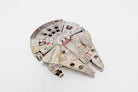 Insight Editions Star Wars Millennium Falcon 3D wood model kit with accompanying book, detailed model of the iconic spaceship.