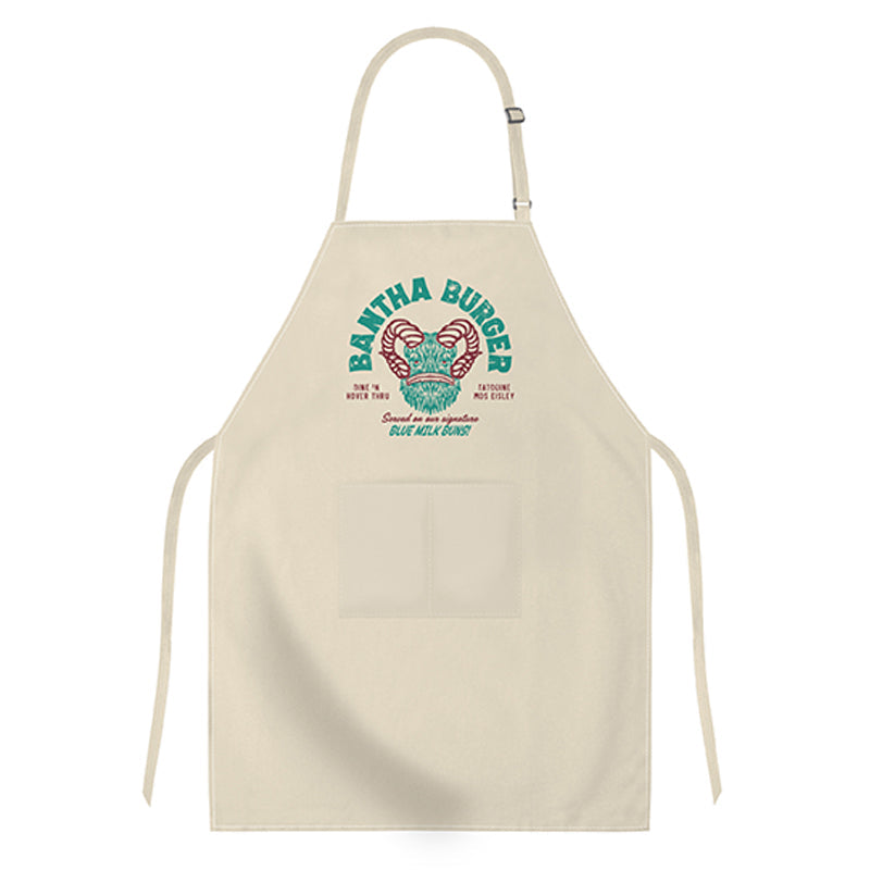 Star Wars gift set with cookbook and apron from Insight Editions, featuring iconic Star Wars characters and themed kitchen accessories.