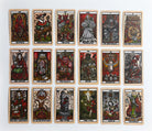 Inside view of the Tarot del Toro kit by Insight Editions, featuring tarot cards and guidebook laid out on a surface.