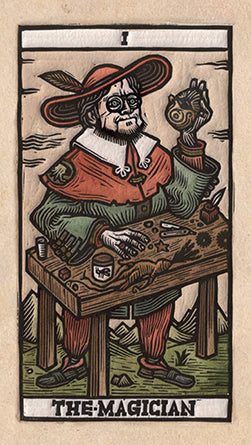 Insight Editions Tarot del Toro kit with colorful tarot cards spread out on a wooden surface.
