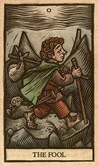 Interior of The Lord of the Rings Tarot Deck and Guide kit by Insight Editions, showing detailed tarot cards and guidebook pages.