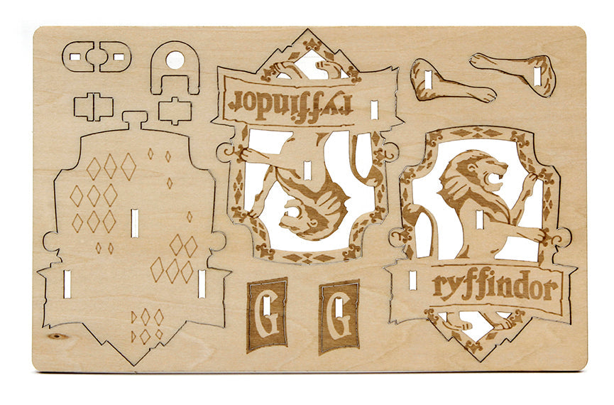 Harry Potter Gryffindor IncrediBuilds Emblematics kit with stationery and collectible emblem from Insight Editions.