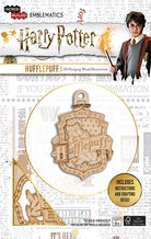 Harry Potter Hufflepuff IncrediBuilds Emblematics kit with stationery and collectible emblem from Insight Editions.