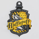 Hufflepuff Harry Potter IncrediBuilds Emblematics kit featuring stationery and collectible elements from Insight Editions.