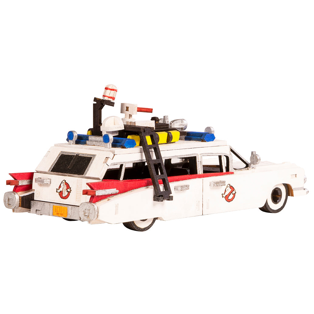 IncrediBuilds Ghostbusters Ectomobile kit featuring a book and 3D wood model of the iconic Ecto-1 vehicle by Insight Editions.