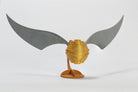 IncrediBuilds Harry Potter Golden Snitch 3D wood model kit, featuring detailed wooden craft of the iconic Quidditch game object.