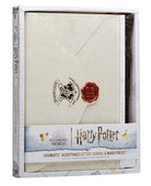 Hardbound Harry Potter Hogwarts Acceptance Letter journal and wand pen set by Insight Editions, featuring magical design and detailed craftsmanship.