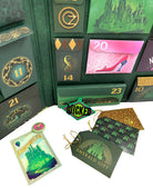 Inside view of the Wicked: The Official Advent Calendar kit by Insight Editions, featuring themed pages and festive design elements.