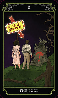 Beetlejuice Tarot Deck and Guide kit with softbound book, featuring spooky cartoon-style illustrations for tarot reading.