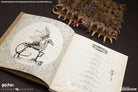Limited edition Harry Potter Monster Book of Monsters replica by Insight Editions, showing detailed interior pages and design features.