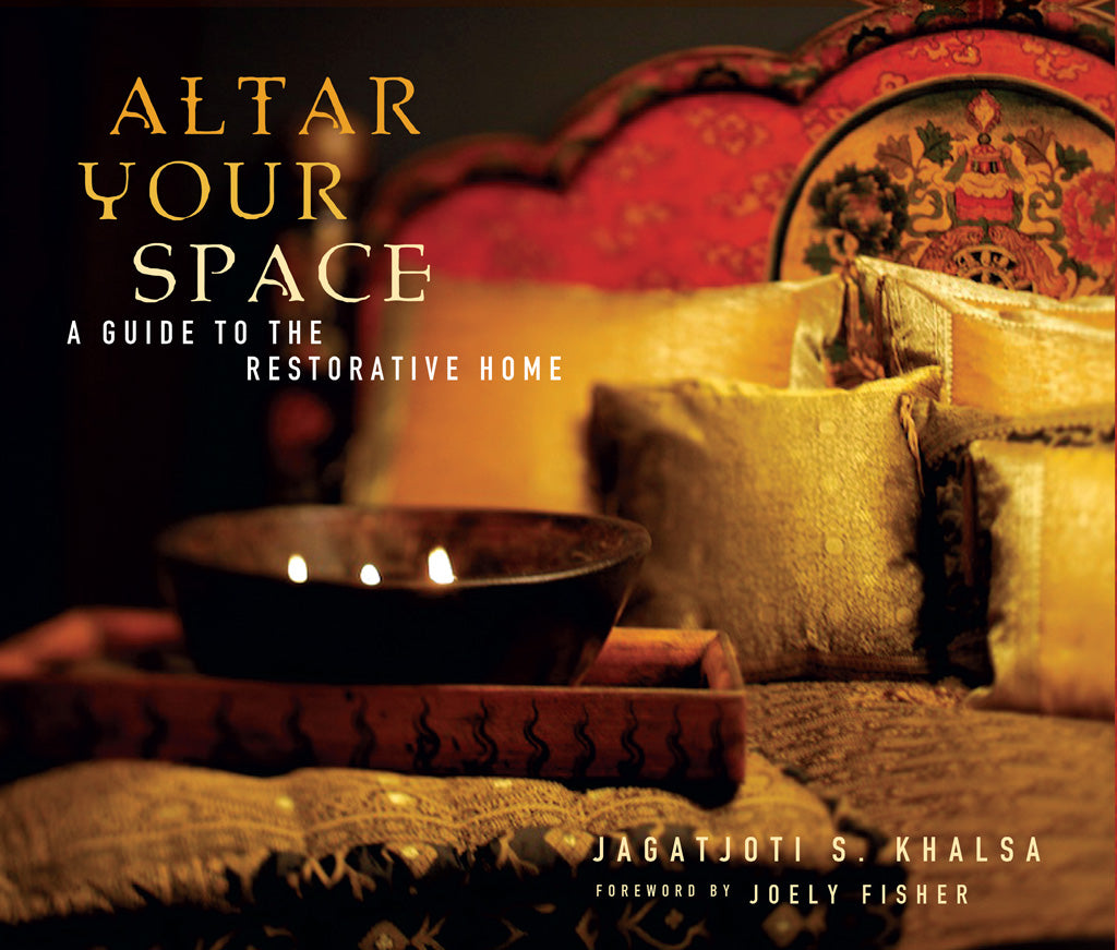 Softcover copy of "Altar Your Space" by Insight Editions featuring a spiritual altar setup on the cover.