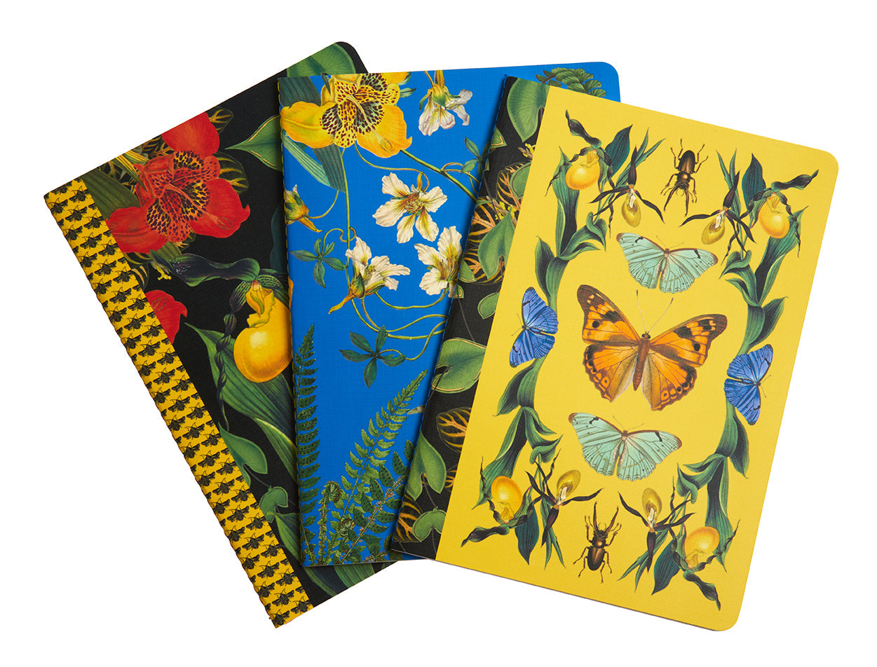 Set of three Insight Editions botanical sewn notebooks with softcover art of nature designs, ideal for journaling or note-taking.