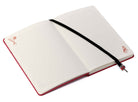 Softcover Harley Quinn journal by Insight Editions with ribbon charm, featuring colorful comic-style illustrations on the cover.
