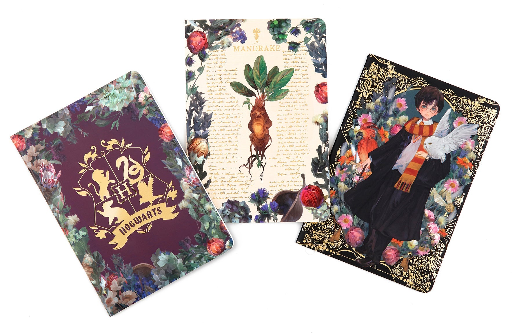 Set of three softcover Harry Potter Floral Fantasy planner notebooks by Insight Editions with magical floral cover designs.