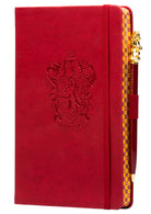 Gryffindor Harry Potter softcover journal with pen, featuring classic Hogwarts house crest and detailed cover design.
