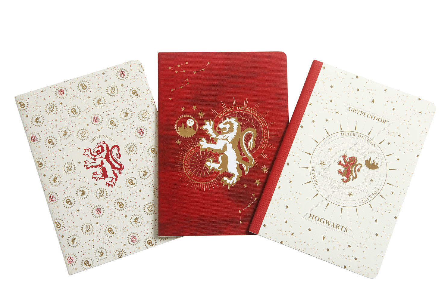 Set of three Harry Potter Gryffindor constellation sewn softcover notebooks by Insight Editions featuring magical starry designs.