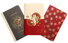 Set of three softcover Harry Potter Gryffindor constellation sewn pocket notebooks by Insight Editions with celestial cover designs.