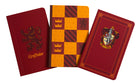 Set of three Harry Potter Gryffindor softcover pocket notebooks from Insight Editions, featuring house crest and magical design.