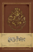 Harry Potter Hogwarts ruled notebook in softcover by Insight Editions, featuring iconic Hogwarts design on the cover.