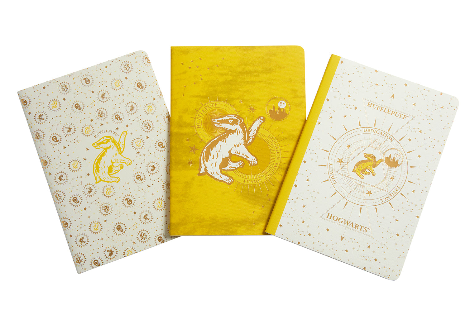 Set of three Harry Potter Hufflepuff constellation sewn notebooks by Insight Editions, softcover with magical designs.